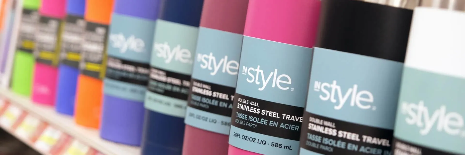 Shelves of travel mugs at Kidd's Home Hardware